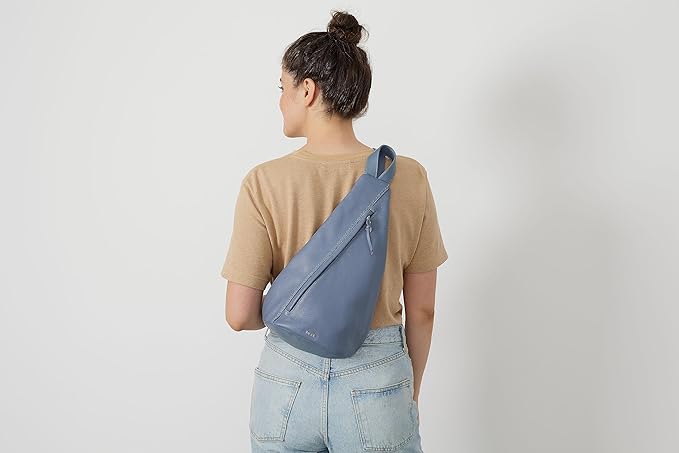 The Sak Geo Sling Backpack in Leather, Convertible Design, Maritime